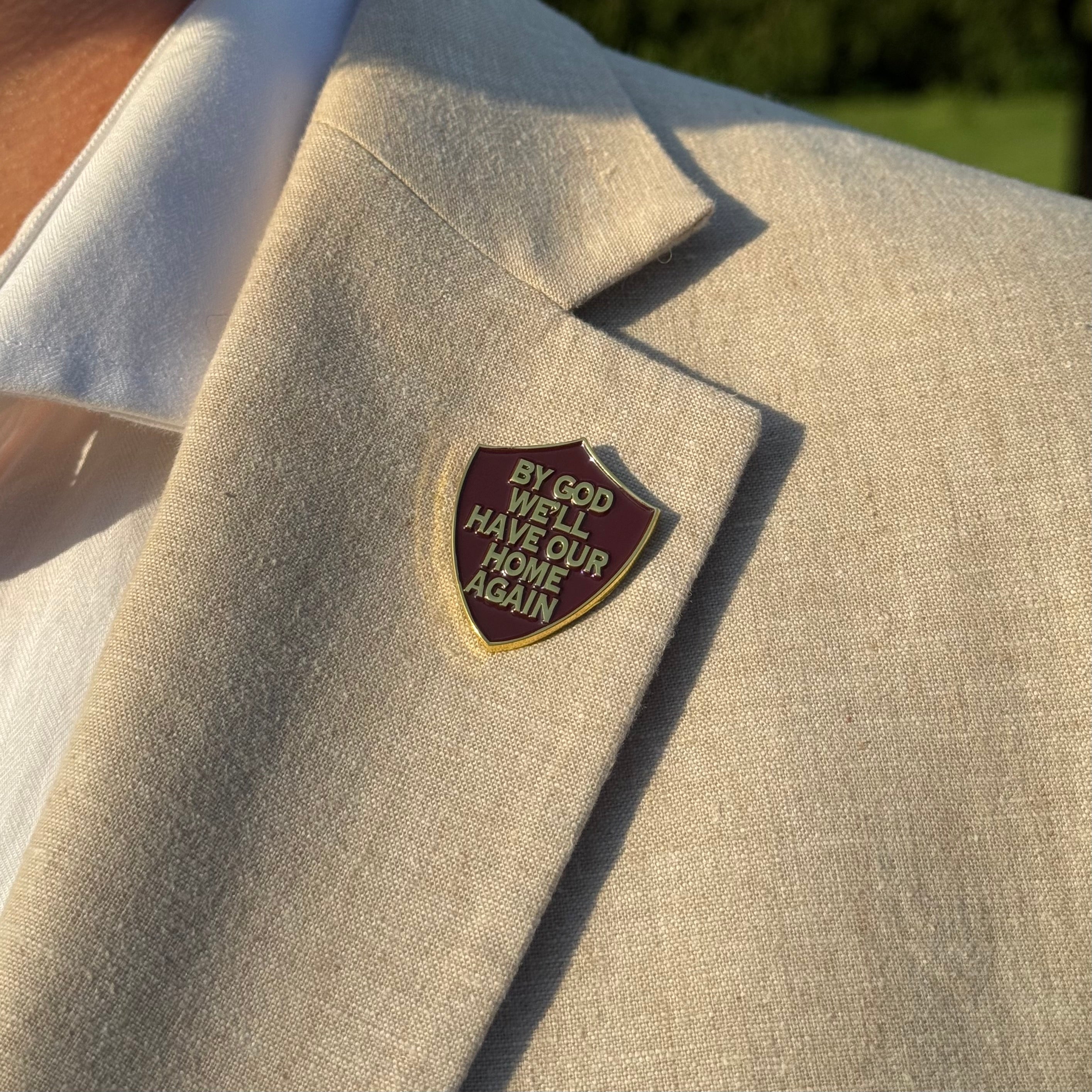 “By God We'll Have Our Home Again" Shield